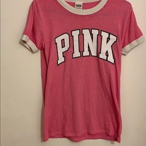 pink t-shirt.